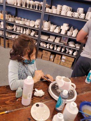 Painting her elephant mug