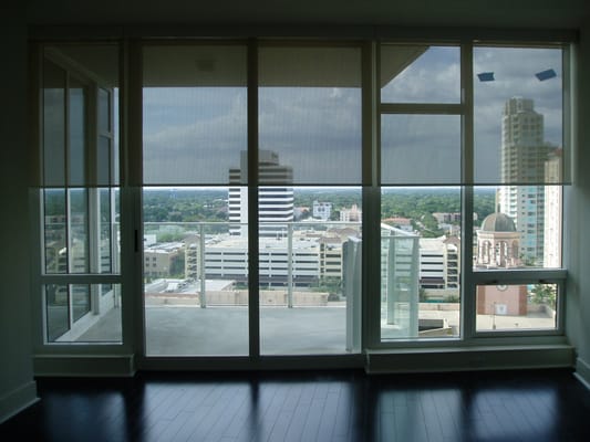 A beautful view of the city of St. Petersburg skyline through a sunscreen roler shade from Unique Wholesale.