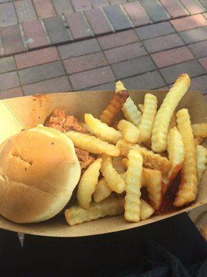 Pulled pork sandwich with fries