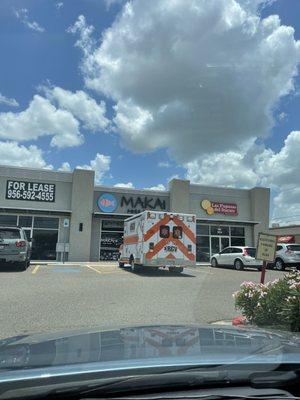 Ambulance employees parked on Handicapped spot while having lunch. Taking spaces away from Handicapped customers