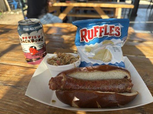 Beer Brat BYO with their spicy sauerkraut that comes with a bag of chips.