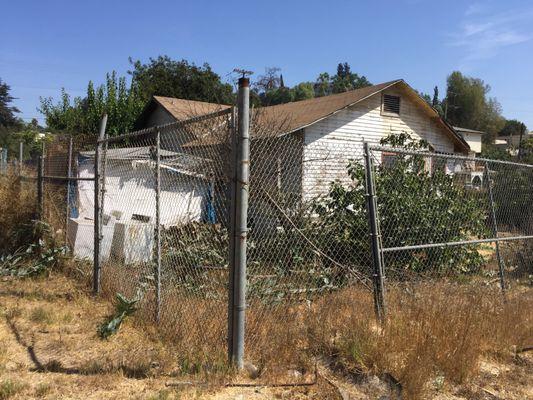 The church is lovely.  But this is how they maintain properties they own in the neighborhood.  Despite years of complaints from community.