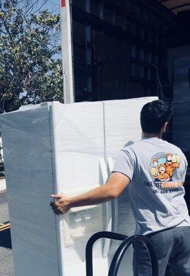 refrigerator moving, with furniture pads and shrink wrap