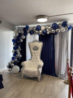 Throne chair rental, one level backdrop and Balloon Garland.