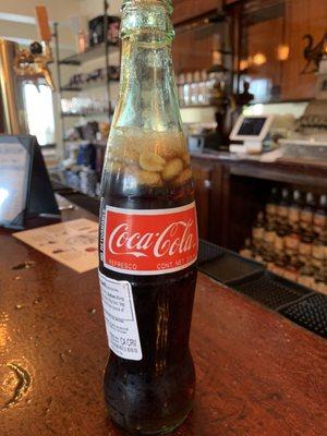 The poor man's snack... coke, peanuts, whiskey in a bottle Tallulah