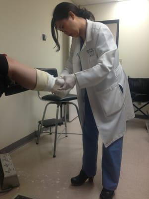 My mom getting her cast done by dr Wendy Wu.