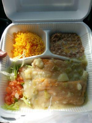 Pork Tamale plate smothered in green chili.