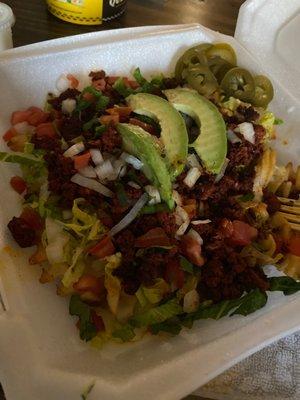 Texas Cheese fries with chorizo al pastor- no sour cream  Absolutely a hidden gem in the menu that you should give a try!