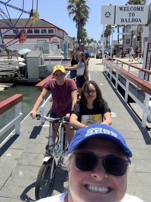 Getting on the Balboa ferry with our rented bikes and scooters.