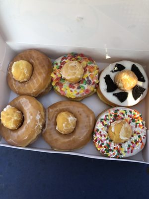 Glazed, cereal, Oreo and sprinkles donuts with free donut holes