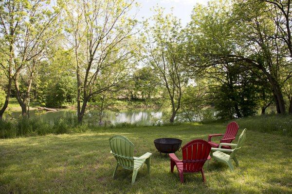 Relax and enjoy a fire next to the lovely, calm river.