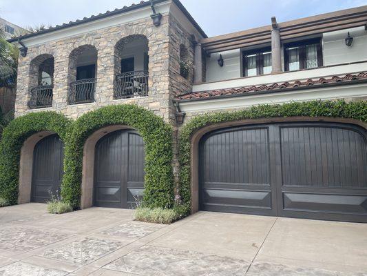 Great looking garage doors in Via Lido stained with a Coffee Bean Chestnut blend.