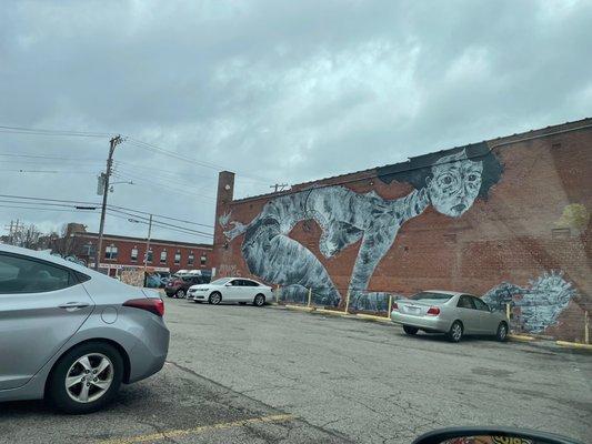 Mural behind some of the coolest small businesses on Cherokee Street