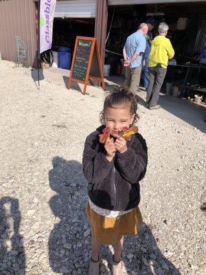 Kid enjoying glass flowers