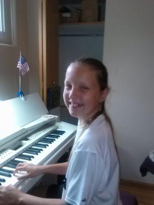 Quinn 10 yr/o Enjoying Her Piano Lessons at First Star Music Studios. "I Love My Piano Lessons and My Teacher Mr. AL.