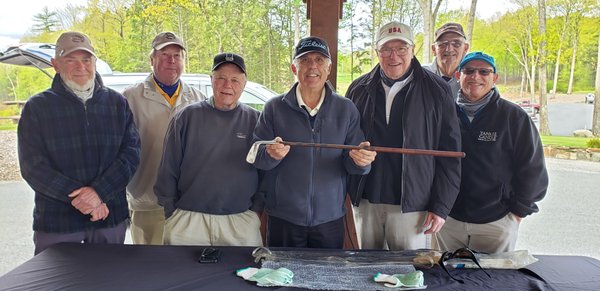 Roger Prevost displays his Calamity Jane putter to the North Quabbin Hillbilly members of the Safari Club.