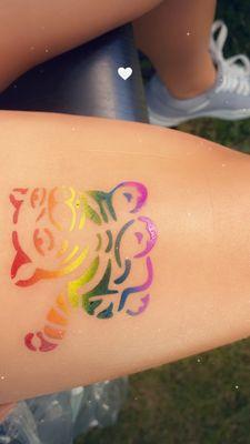 Grrr...Airbrush tiger tattoo in rainbow colors rainbow