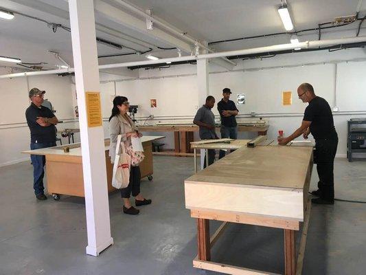 Co-Workers need to pass a certification training to use the Woodshop - here's a diverse group at the October training.