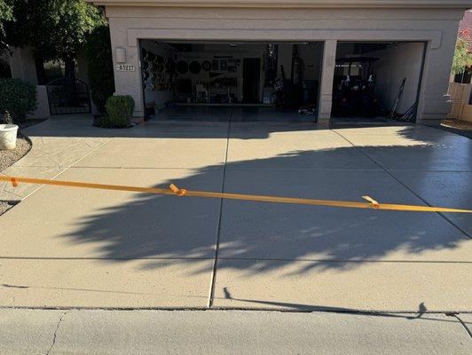 Newly coated driveway and walkway.