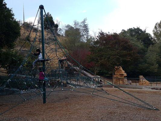 Rope pyramid and climbing rocks