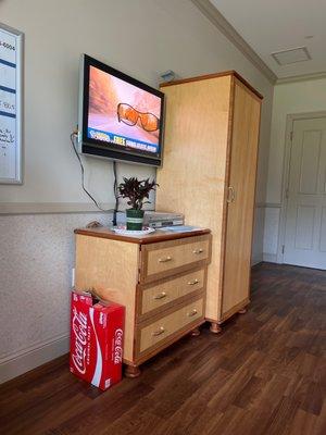 Tv console in room. (Only Pepsi products so we had to bring our own Coke)