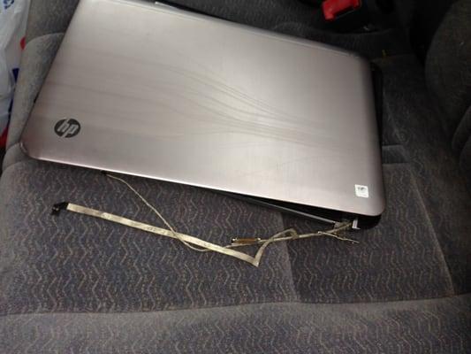 Laptop as returned to me with loose wires.