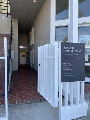 Entrance on Abbot Kinney, look for the neon "gallery" sign.