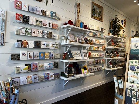 Unique greeting cards and wall art are sold in this store.