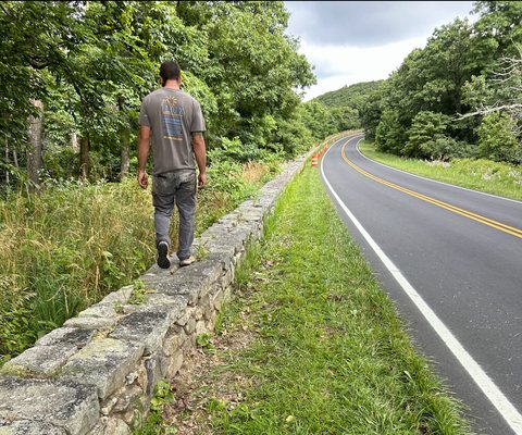 Inspection of stone wall repairs on skyline dr