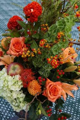 I had two beautiful urns of flowers that served multiple duties during my wedding.