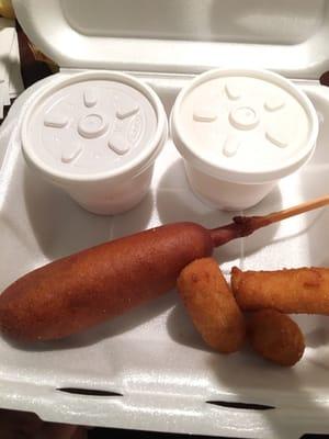 Corn dog with some hush puppies.