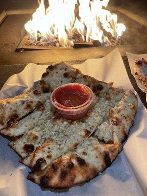 Garlic breadsticks with marinara sauce - $8  Pretty good! Lots of garlic pieces. Not cheesy enough for me