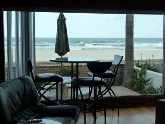 View of Pacific Ocean & South Mission Beach Boardwalk while sitting in the OBO Living Room