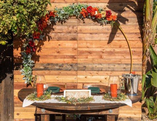 Pallet wall and half round rustic table!