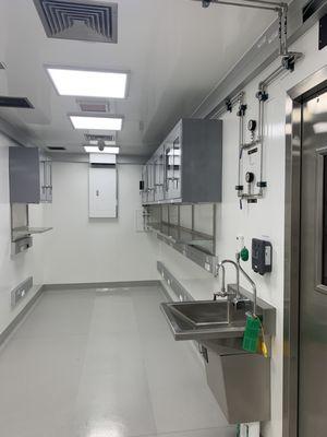 Interior view of an ISO 7 (Class 10,000) BSL-3 cleanroom retrofitted inside a shipping container.