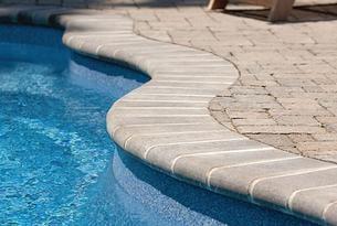 Pool coping is the edging that is placed around the top edge of the swimming pool.  It serves the dual purpose of protecting ...