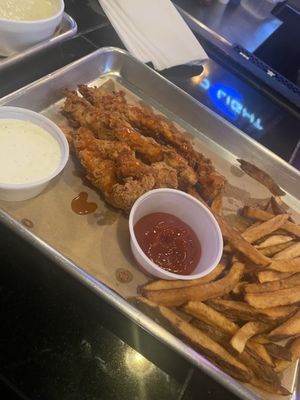 Chicken strips tossed with Buffalo sauce. Bar tender actually offered me more sauce which I said yes please! Very good!