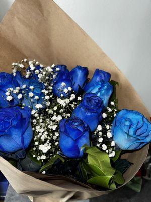 A dozen blue roses