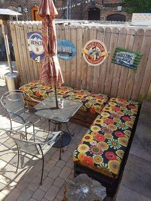 Day view of back patio with and amazing water feature....grab a drink and enjoy!