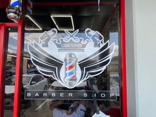 Front logo of Cuban Fashion Barber Shop