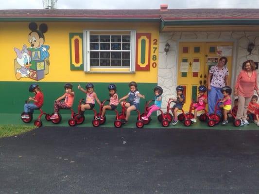 The children on the tricycles!