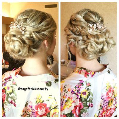 Love this accessory she chose to add to this romantic bridal updo.