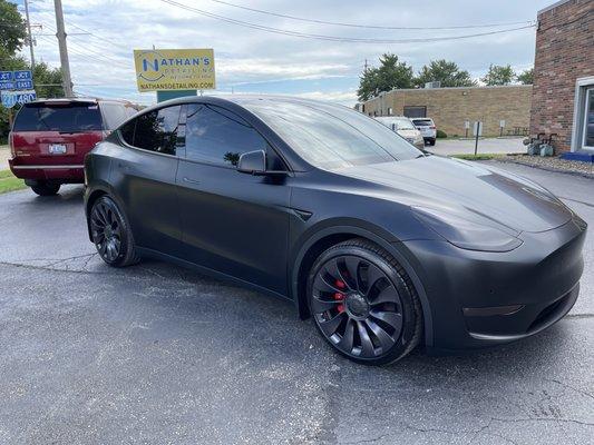 Model Y Performance with matte black PPF, ceramic coating, window tinting, and headlight/rear light tinting.