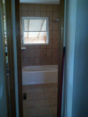 Shower and Flooring Tiling, similar colors. Just an idea for those that like symmetrical...