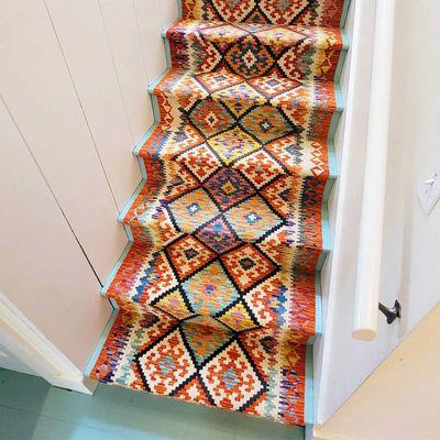 Talk about stairs that POP! Our master craftsman, Josh Tucker, installed these gorgeous hand-woven Afghan Kilims on stairs in Middletown.