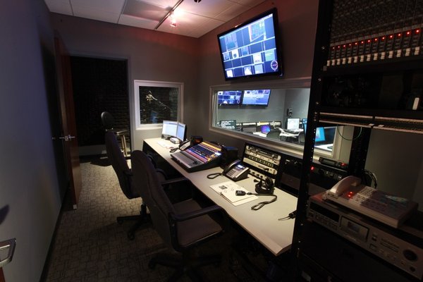 The audio control room with iso booth for VO work.