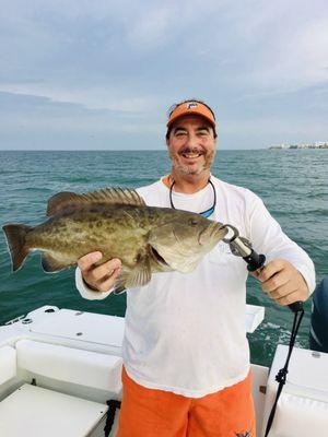 Dave with a boat record Triple Tail!