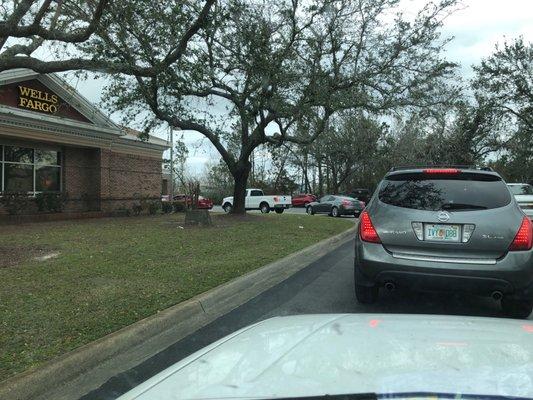 Typical line of cars to get through drive thru