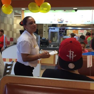 Pollo Campero's Manager welcomes Yelpers.