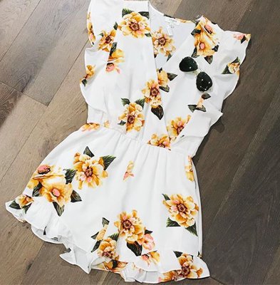 This sunflower romper would be the perfect outfit for a summer music festival.